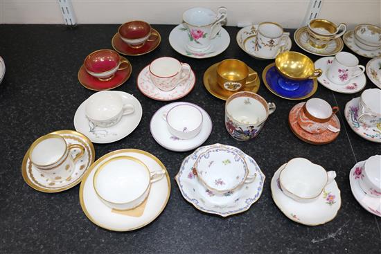 A collection of twenty eight Continental porcelain tea and coffee cups and saucers and four other cups, late 18th - early 20th century,